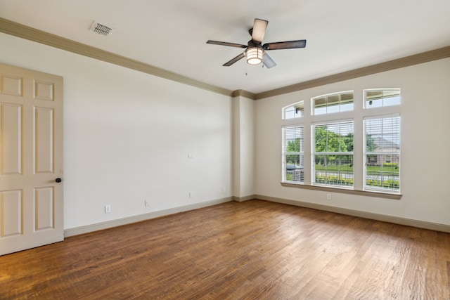 5805 Parker Village Dr, Parker, TX 75002 - spare room featuring ornamental molding, wood finished floors, ceiling fan, and baseboards