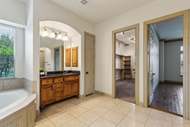 5805 Parker Village Dr, Parker, TX 75002 - full bath with tile patterned floors, a bath, vanity, and baseboards