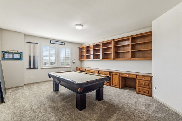 rec room with light carpet, billiards, baseboards, and built in desk