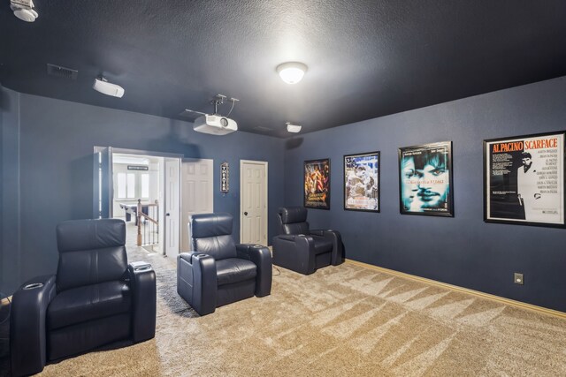5805 Parker Village Dr, Parker, TX 75002 - carpeted home theater room featuring baseboards and a textured ceiling