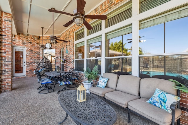 view of patio / terrace featuring a ceiling fan and outdoor lounge area