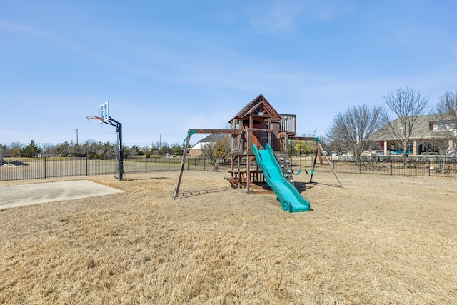 community jungle gym featuring fence