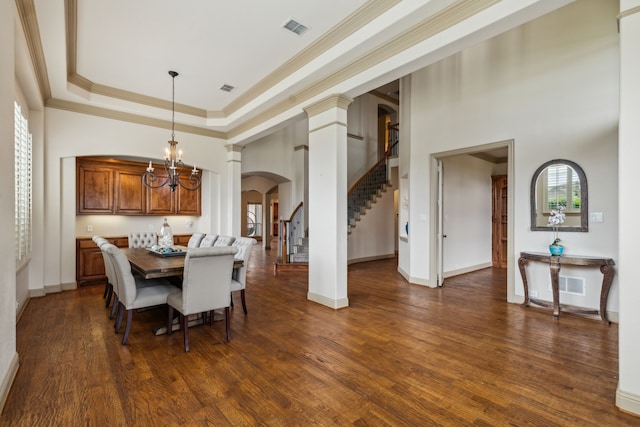 5805 Parker Village Dr, Parker, TX 75002 - dining area with ornate columns, arched walkways, stairway, ornamental molding, and a towering ceiling