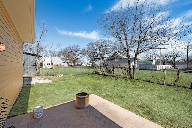 view of yard featuring a patio area and fence