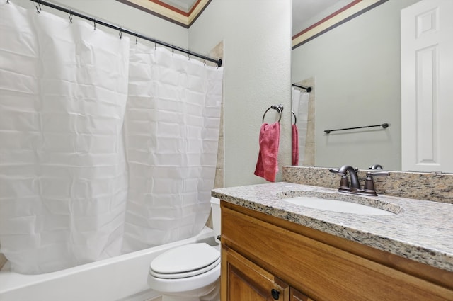 full bathroom with crown molding, toilet, vanity, and shower / bath combo