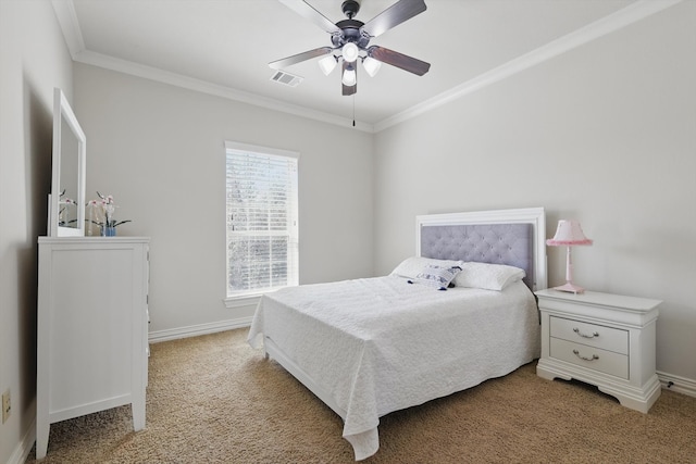 bedroom featuring a ceiling fan, baseboards, visible vents, ornamental molding, and light colored carpet