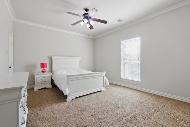 bedroom with visible vents, a ceiling fan, carpet flooring, crown molding, and baseboards