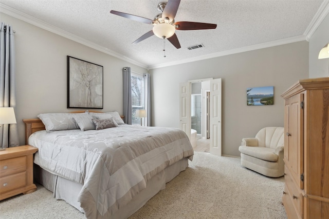 bedroom with visible vents, ornamental molding, light carpet, ceiling fan, and a textured ceiling