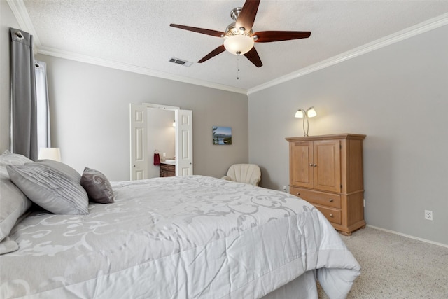 bedroom featuring light colored carpet, visible vents, crown molding, and a textured ceiling