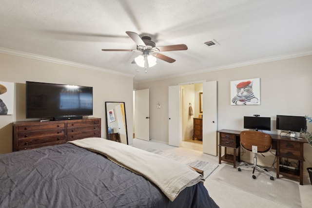 carpeted bedroom featuring ensuite bath, a ceiling fan, visible vents, and ornamental molding