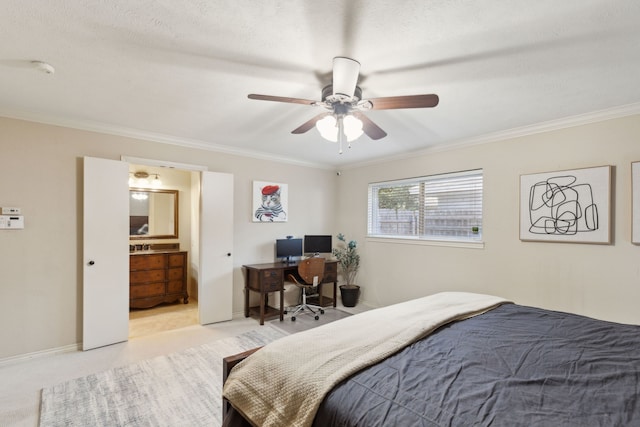 carpeted bedroom with crown molding, ceiling fan, and connected bathroom