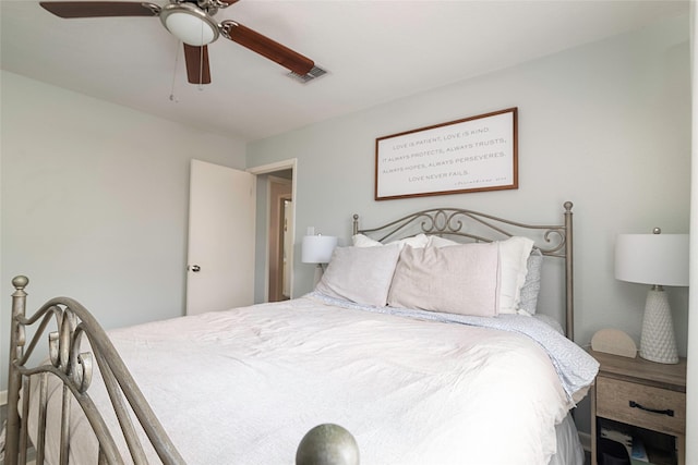 bedroom with visible vents and a ceiling fan