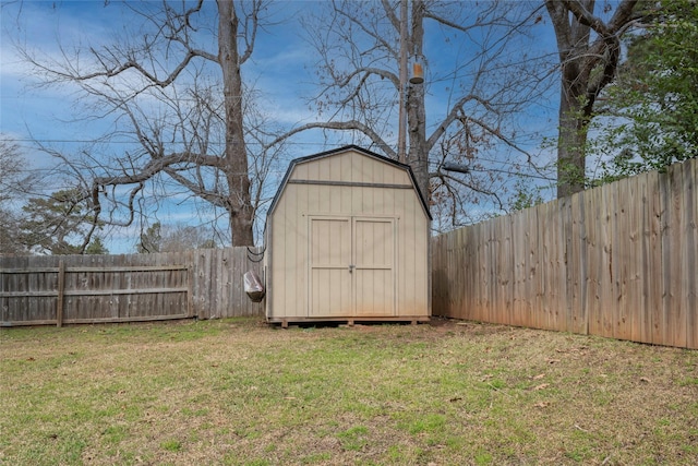 view of shed with a fenced backyard