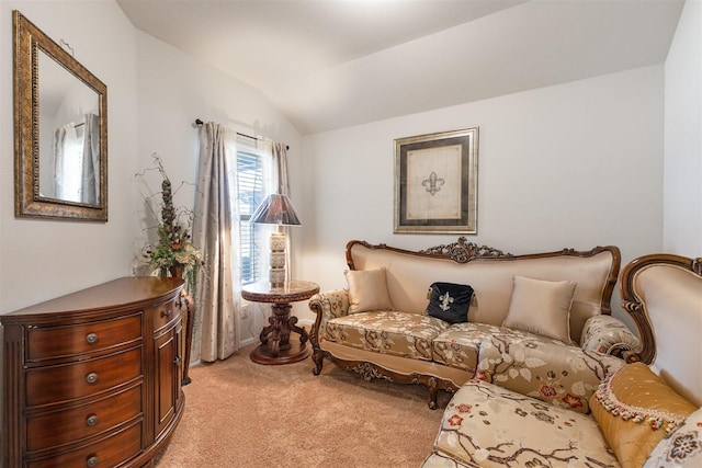 living area featuring light carpet and lofted ceiling