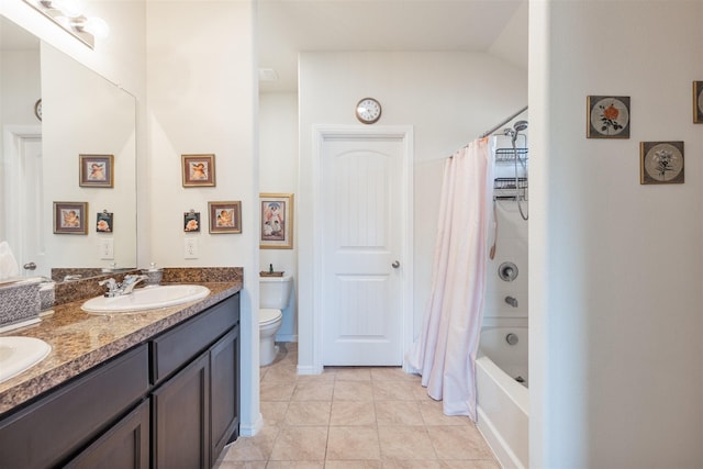 full bath with double vanity, toilet, tile patterned floors, shower / bathtub combination with curtain, and a sink