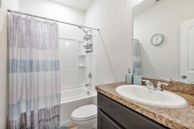 bathroom featuring toilet, shower / tub combo with curtain, and vanity