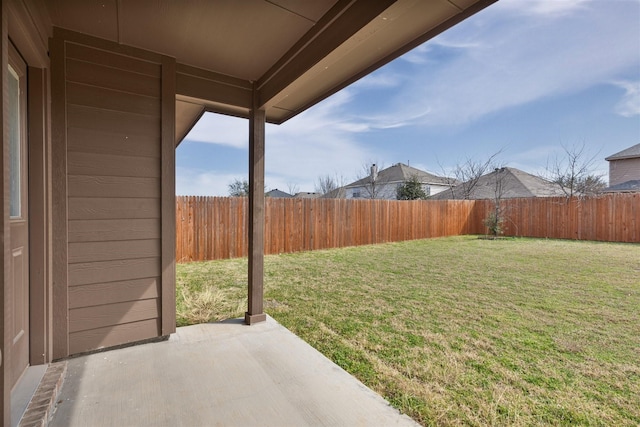 view of yard with a fenced backyard and a patio