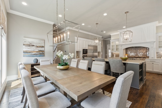 dining area featuring dark wood finished floors, recessed lighting, stairway, ornamental molding, and a chandelier