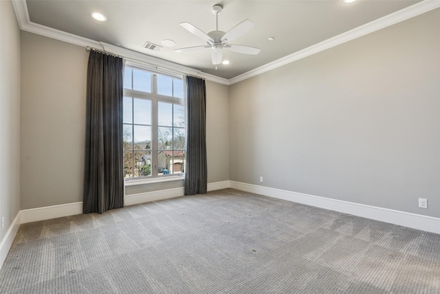 spare room with baseboards, ceiling fan, carpet, crown molding, and recessed lighting