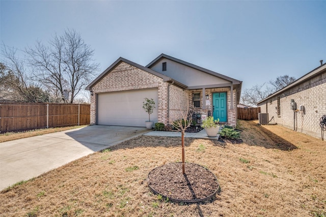 ranch-style house with central AC unit, a garage, brick siding, fence, and concrete driveway