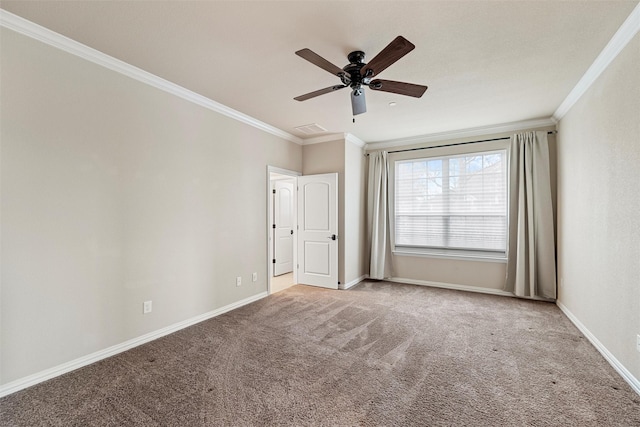 unfurnished bedroom with carpet floors, ornamental molding, visible vents, and baseboards