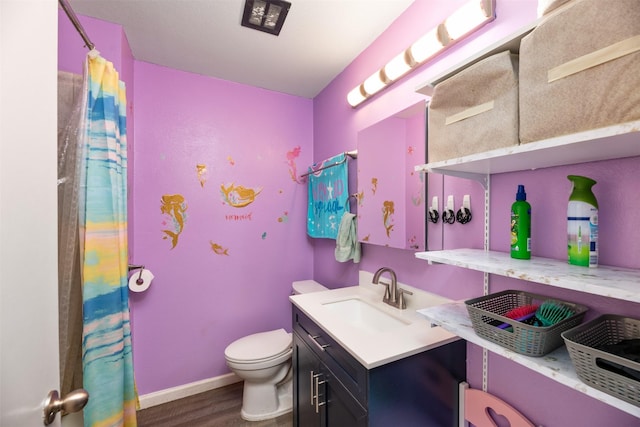 full bathroom with a shower with shower curtain, toilet, vanity, wood finished floors, and baseboards