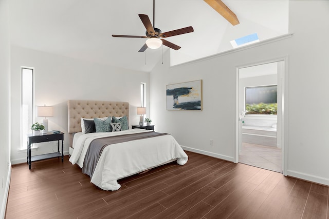 bedroom featuring high vaulted ceiling, connected bathroom, wood finished floors, baseboards, and beamed ceiling