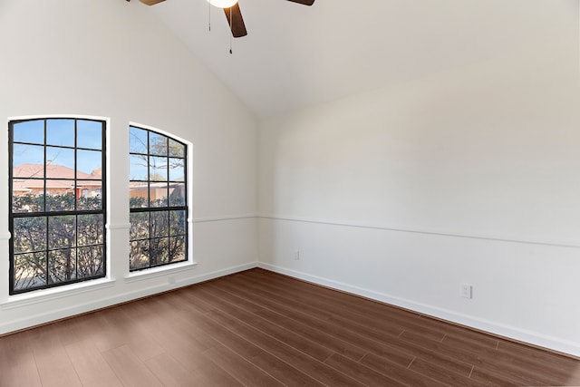 unfurnished room featuring high vaulted ceiling, a ceiling fan, baseboards, and dark wood-type flooring