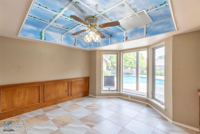 20 Glen Abbey St, Abilene, TX 79606 - spare room with ceiling fan, baseboards, and light tile patterned floors