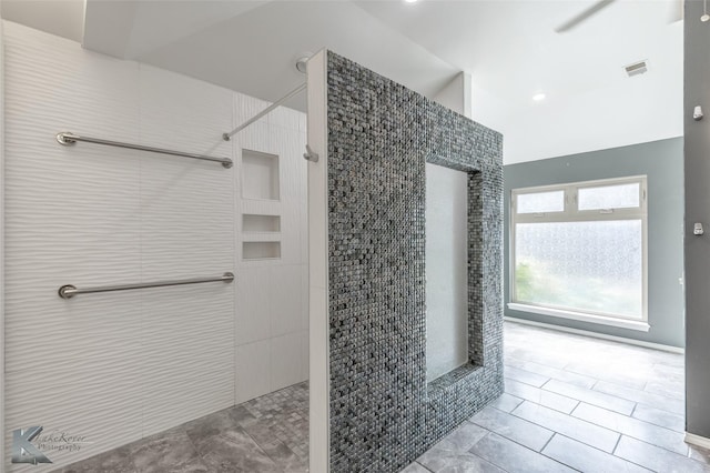 20 Glen Abbey St, Abilene, TX 79606 - bathroom featuring tiled shower and tile patterned floors