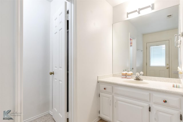 20 Glen Abbey St, Abilene, TX 79606 - bathroom with vanity and baseboards