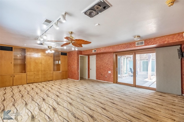 20 Glen Abbey St, Abilene, TX 79606 - unfurnished living room with ceiling fan and track lighting