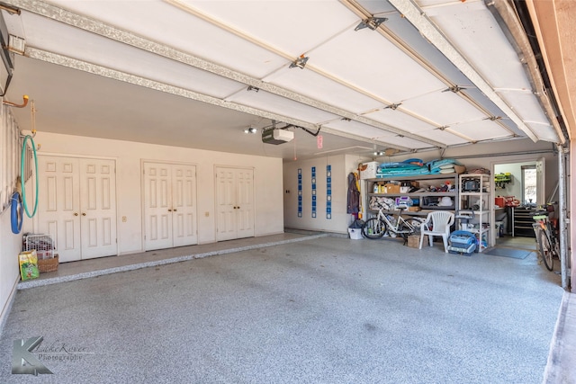 garage featuring a garage door opener