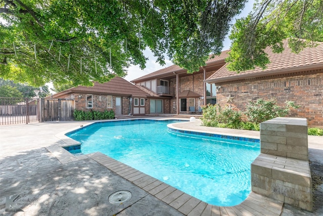 20 Glen Abbey St, Abilene, TX 79606 - view of swimming pool featuring a patio area