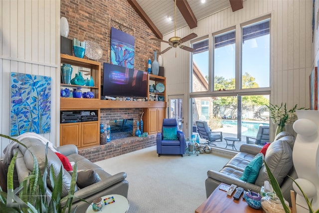 carpeted living area featuring wooden ceiling, brick wall, a fireplace, high vaulted ceiling, and beam ceiling