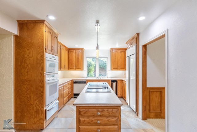 20 Glen Abbey St, Abilene, TX 79606 - kitchen featuring dishwasher, built in refrigerator, electric stovetop, a warming drawer, and a kitchen island