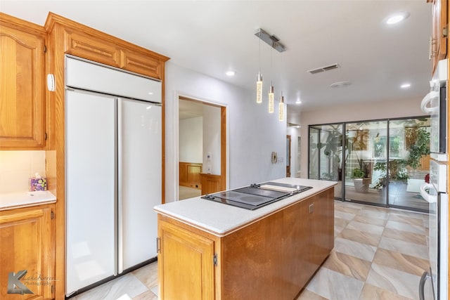 20 Glen Abbey St, Abilene, TX 79606 - kitchen with built in refrigerator, black electric cooktop, light countertops, a kitchen island, and recessed lighting