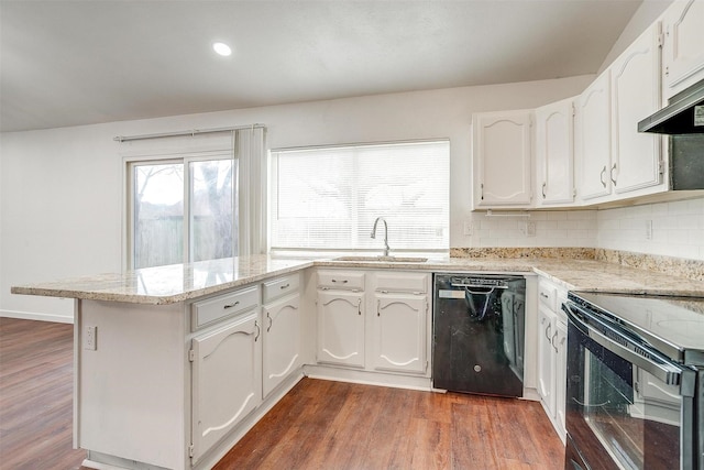 kitchen featuring black appliances, dark wood-style floors, white cabinetry, and a sink