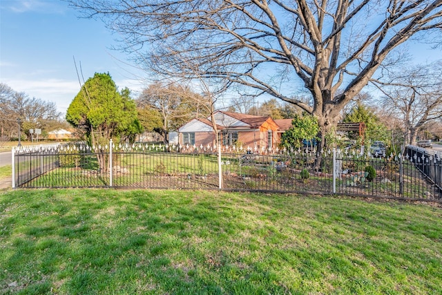 view of yard with a fenced front yard