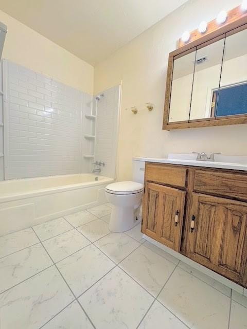 bathroom with marble finish floor, shower / washtub combination, vanity, and toilet