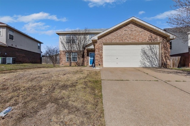 view of front facade featuring brick siding, driveway, central AC, and an attached garage