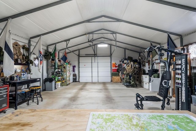 garage with metal wall and a workshop area