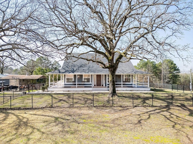 view of front of property featuring a fenced backyard