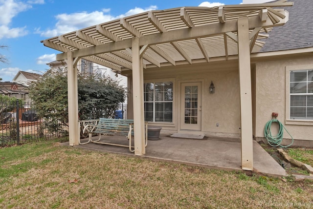 exterior space featuring a pergola and fence