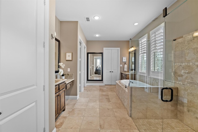 bathroom featuring tile patterned flooring, recessed lighting, vanity, visible vents, and a shower stall