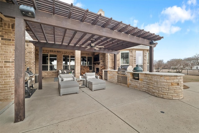 view of patio featuring an outdoor hangout area, exterior kitchen, area for grilling, and a pergola