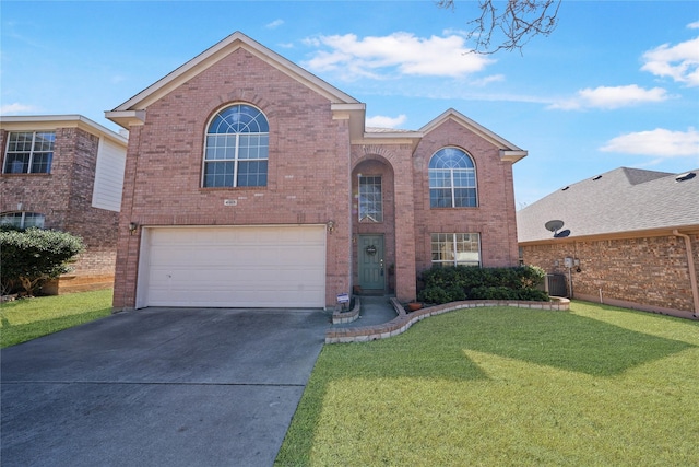 traditional home featuring concrete driveway, an attached garage, a front lawn, central AC, and brick siding