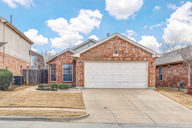 ranch-style home with a garage, central AC unit, concrete driveway, fence, and brick siding