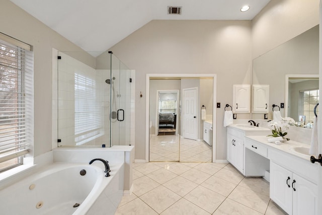 bathroom featuring ensuite bathroom, visible vents, a jetted tub, a shower stall, and double vanity