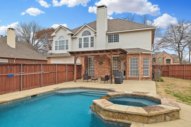 back of house featuring brick siding, a patio, a chimney, a pergola, and a fenced backyard
